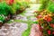 BeautifulÃƒÆ’Ã¢â‚¬Å¡Ãƒâ€šÃ‚Â garden and stone path and  blooming flower and tree with green leaves